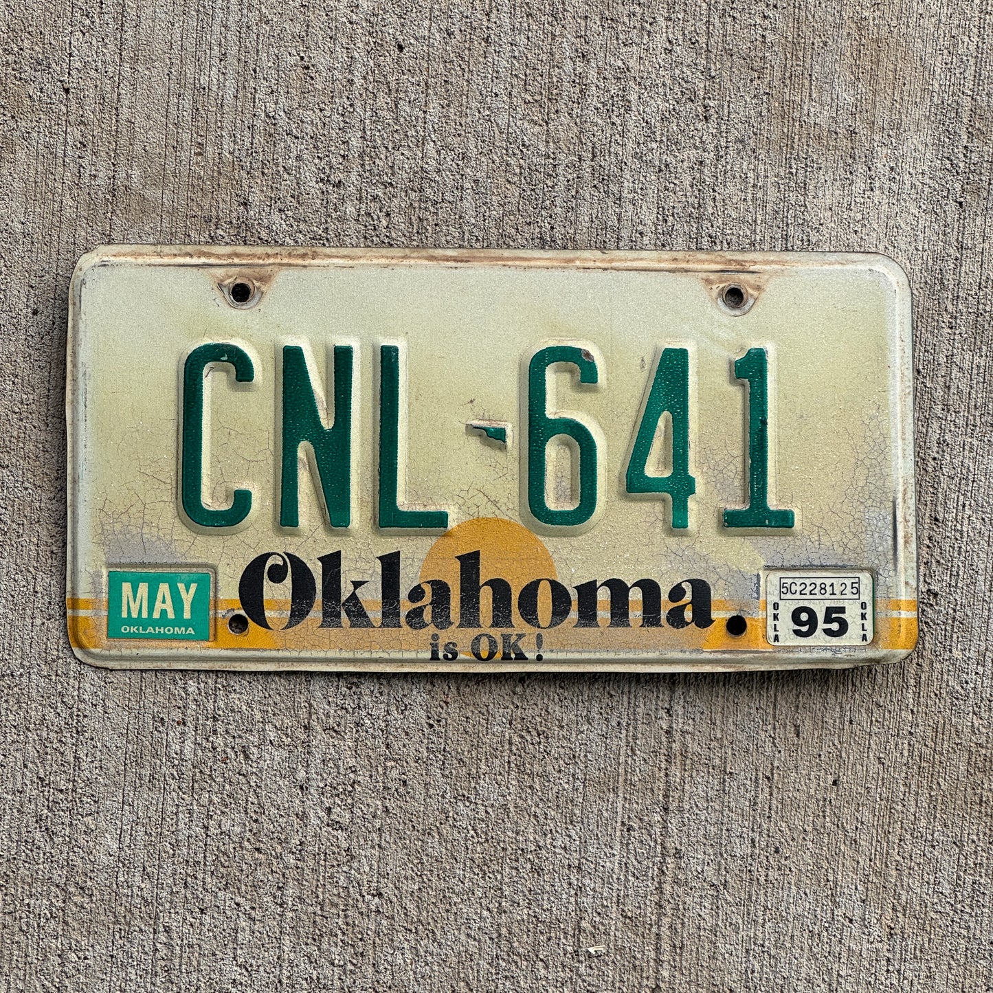 Photo of a 1982 1995 Oklahoma License Plate Auto Tag Garage Decor Vintage CNL 641 with original patina