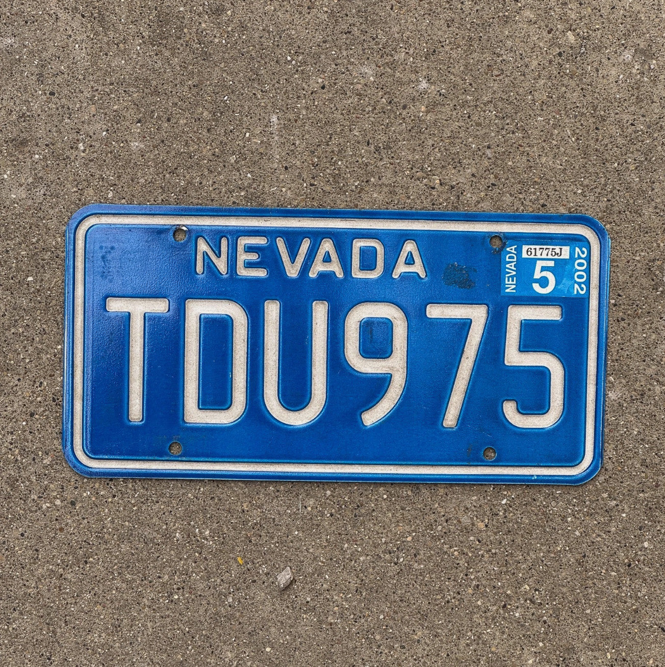 Photo of a 1982 2002 Nevada License Plate Auto Tag Garage Decor TDU 975