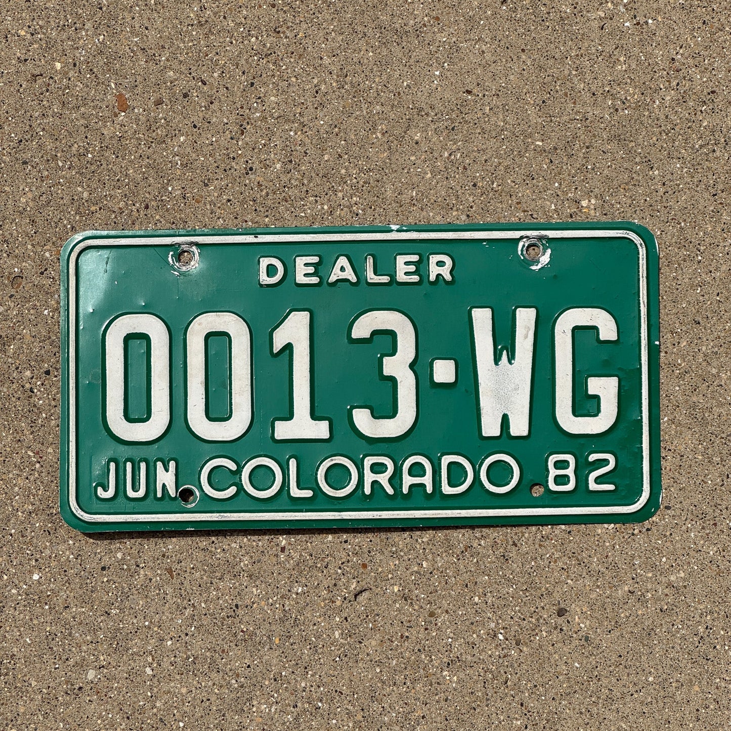 Photo of a 1982 Colorado Dealer License Plate Auto Tag Garage Decor Vintage 0013 WG