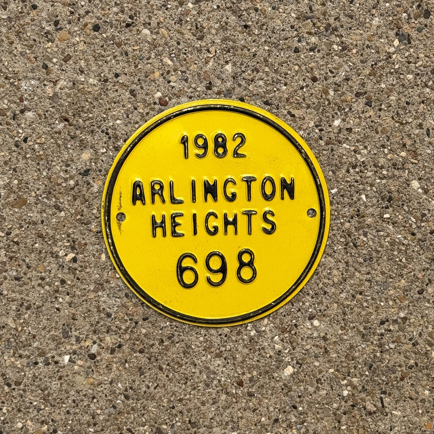 Photo of a 1982 Illinois Bicycle Auto Tag Garage Decor Vintage Arlington Heights 698