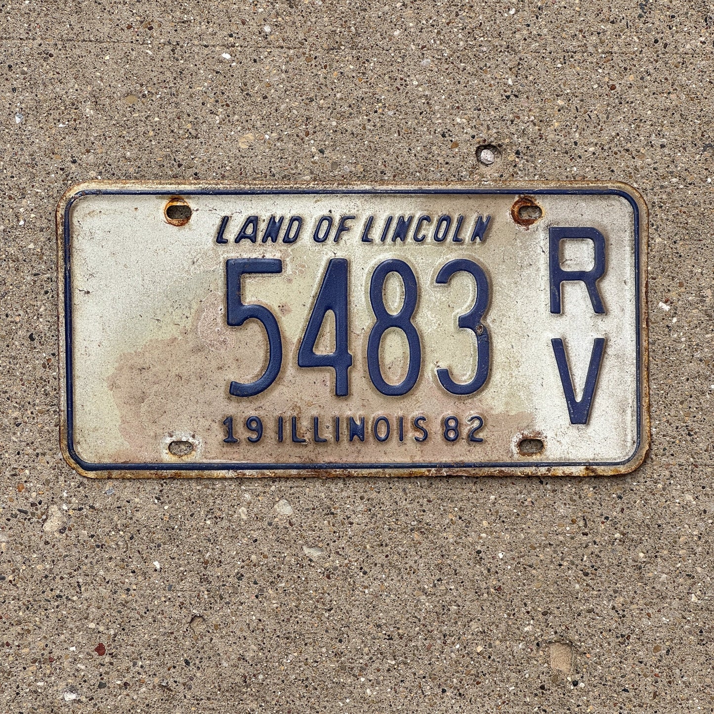 Photo of a 1982 Illinois RV License Plate Auto Tag Garage Decor Vintage 5483