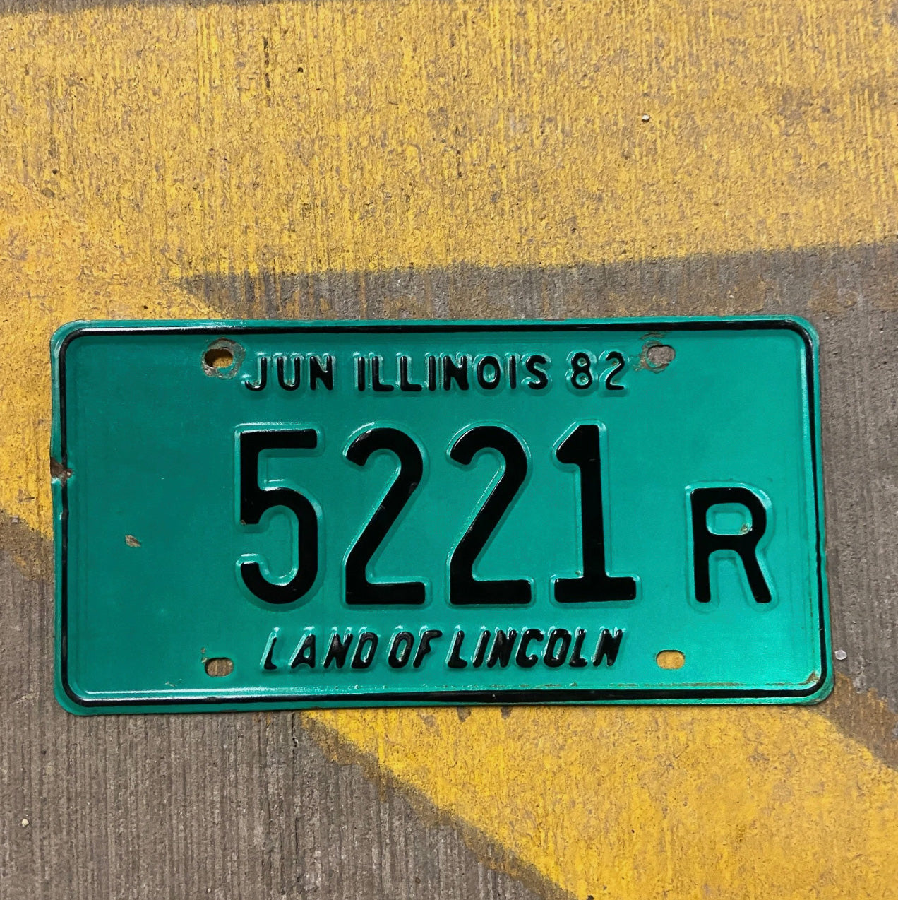 Photo of a 1982 Illinois Truck License Plate Auto Tag Garage Decor Vintage 5221 R with original patina