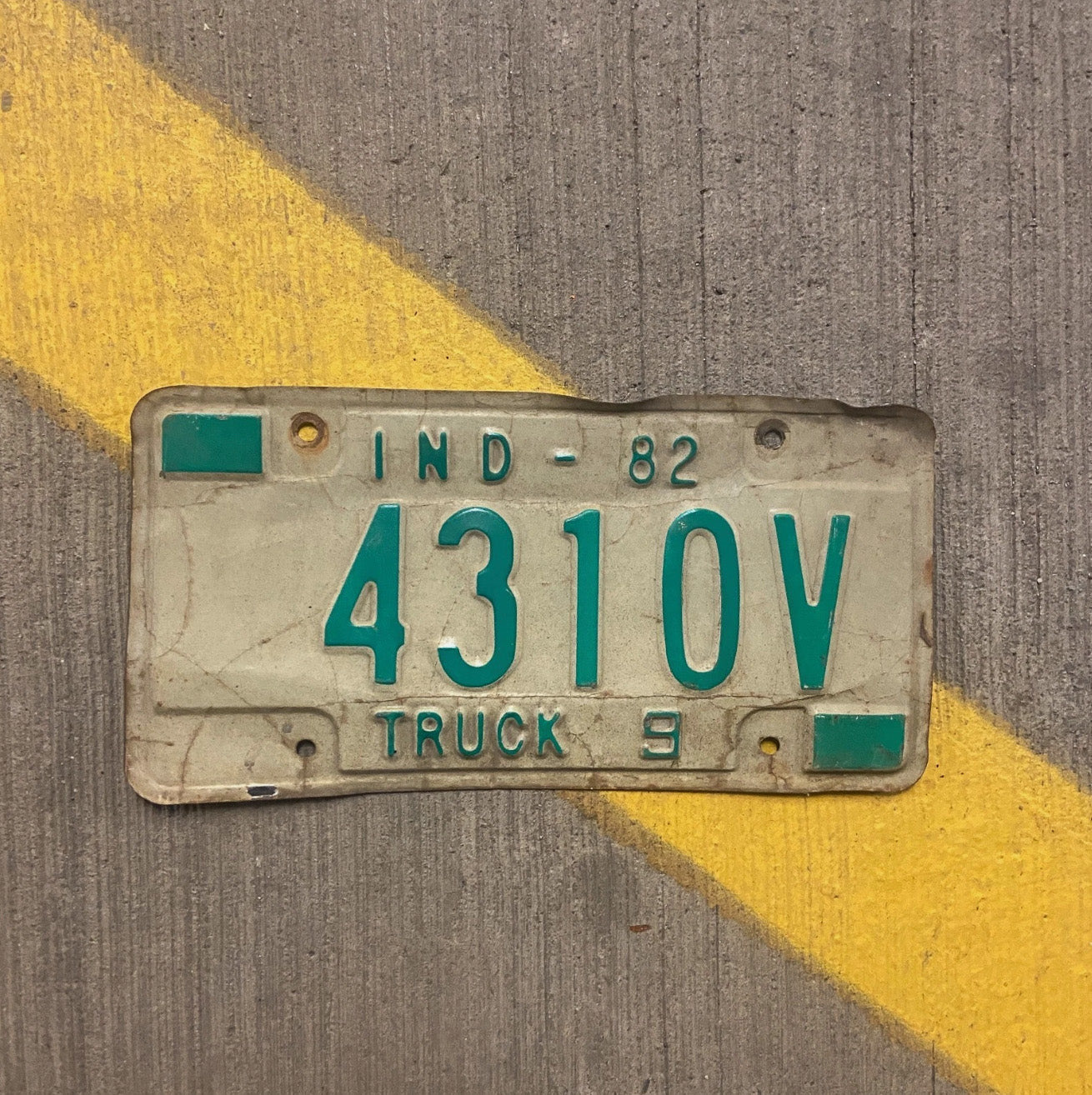 Photo of a 1982 Indiana Truck License Plate Auto Tag Garage Decor Vintage 4301 V