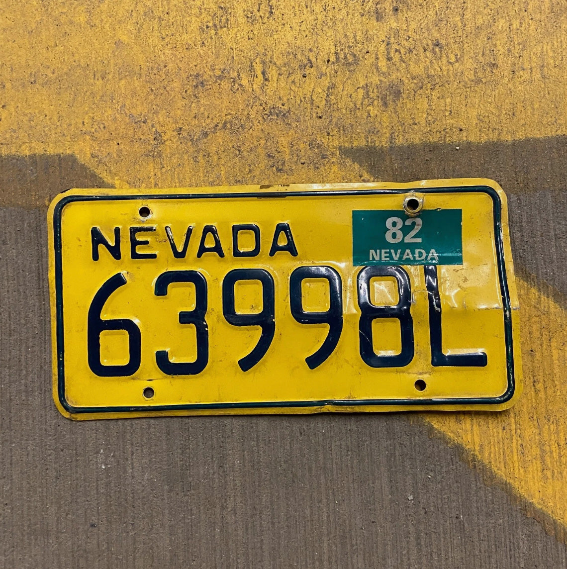 Photo of a 1982 Nevada Mileage Tax License Plate Auto Tag Garage Decor Vintage 63998 L