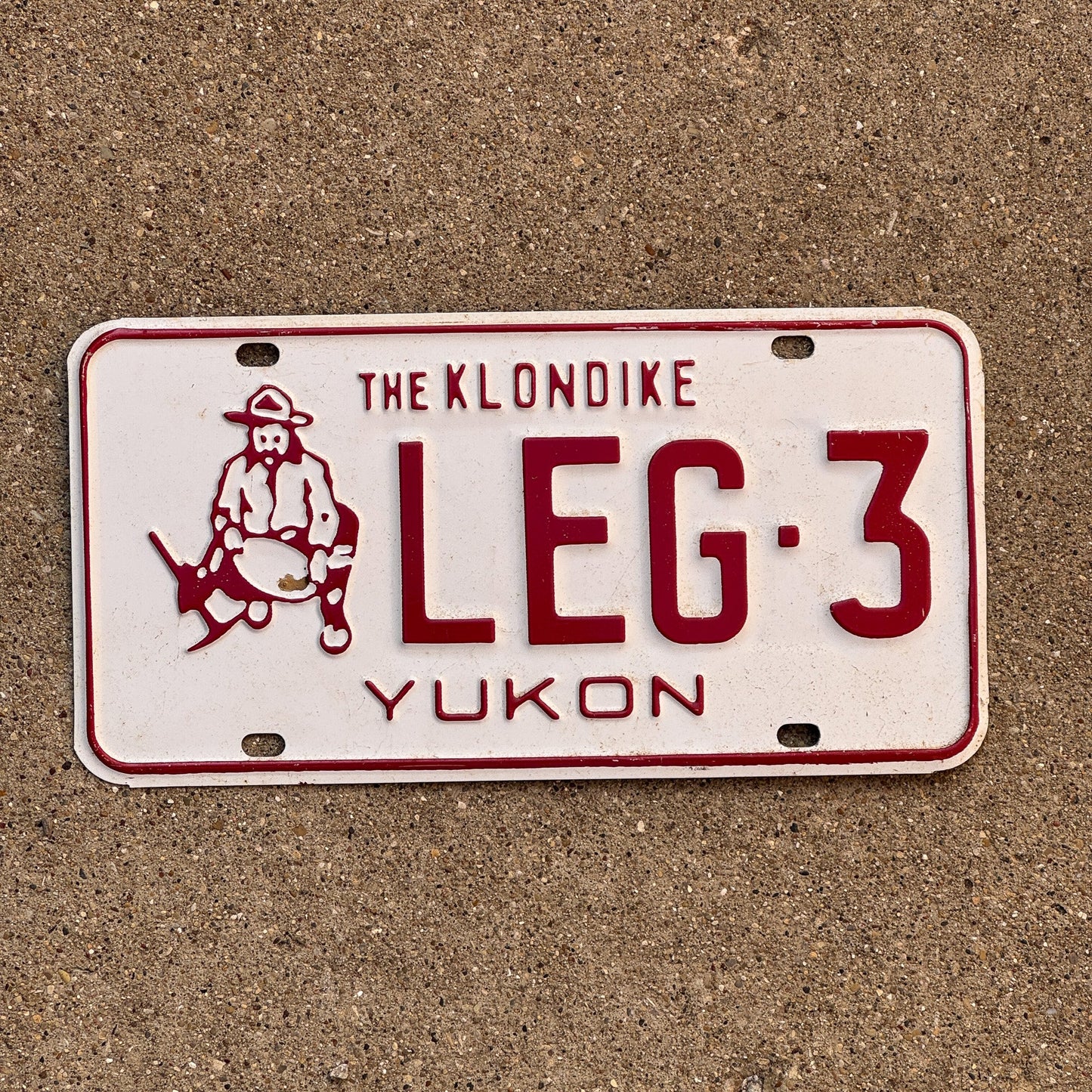 Photo of a 1982 Yukon License Plate Auto Tag Garage Decor Vintage Klondike Gold Miner LEG 3