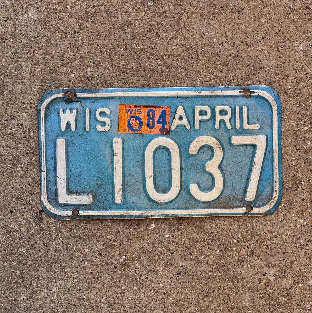 Photo of a 1983 1984 Wisconsin Motorcycle License Plate Auto Tag Garage Decor L 1037