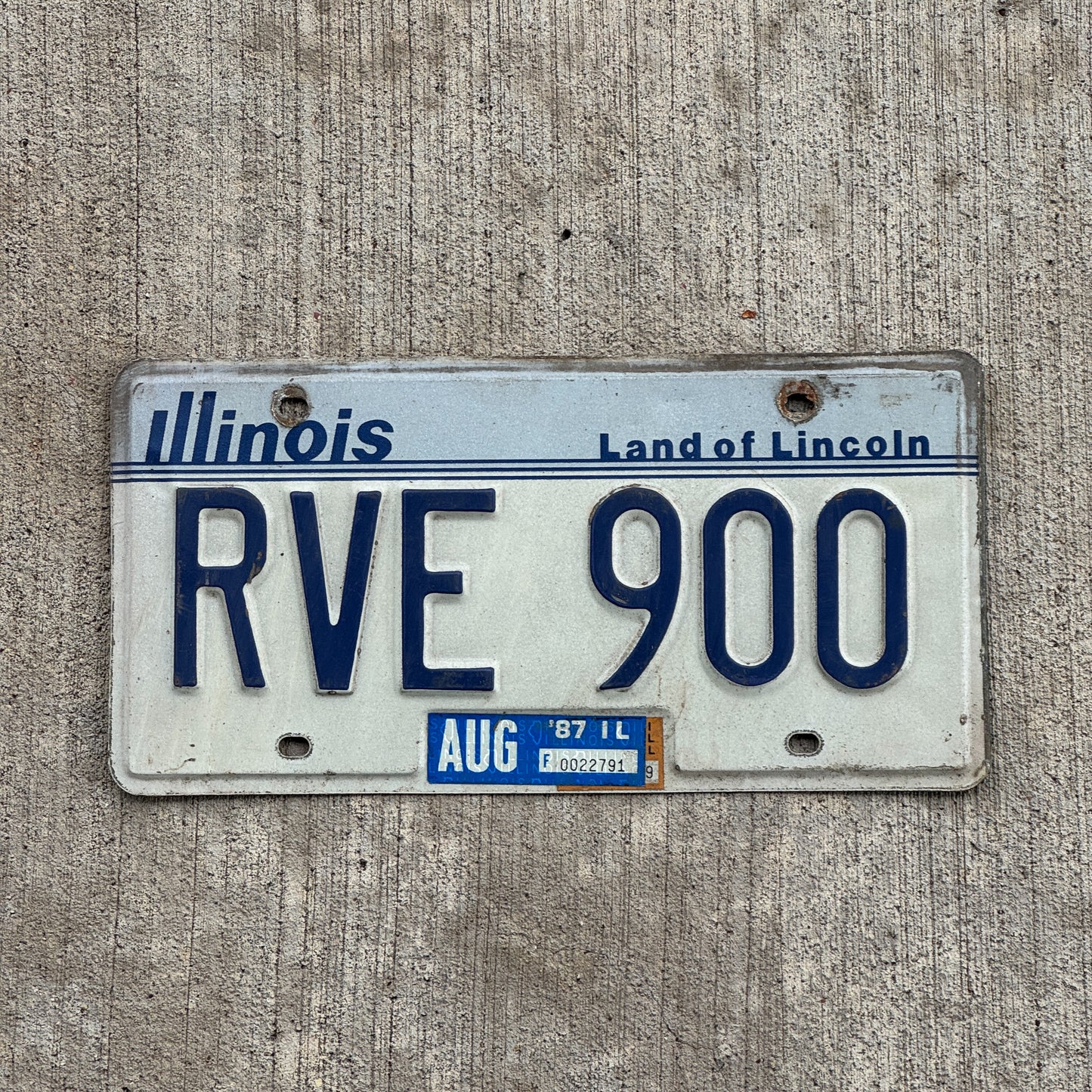 Photo of a 1983 1987 Illinois License Plate Auto Tag Garage Decor Vintage RVE 900 with original patina
