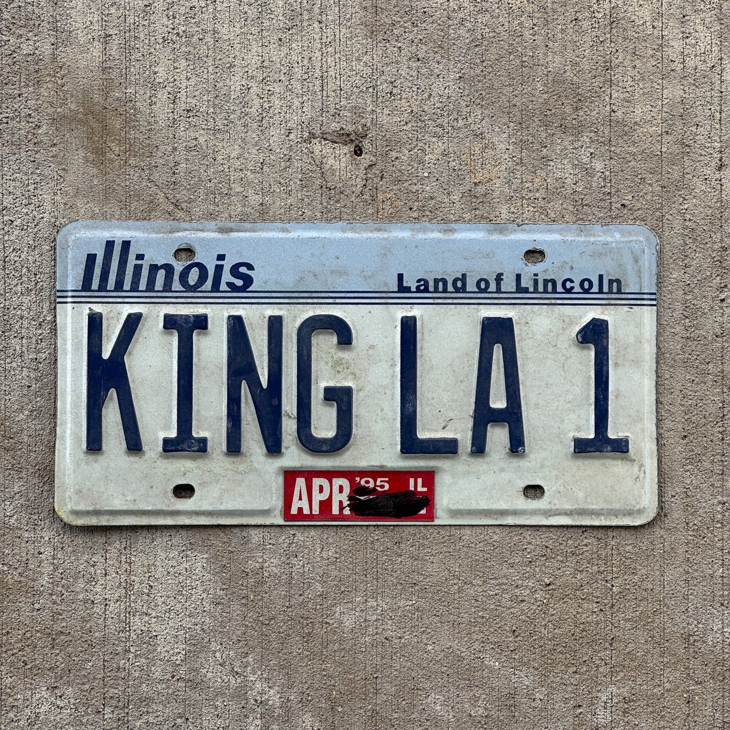 Photo of a 1983 1995 Illinois Vanity License Plate Auto Tag Garage Decor Vintage Los Angeles Kings Fan KING LA 1 with original patina