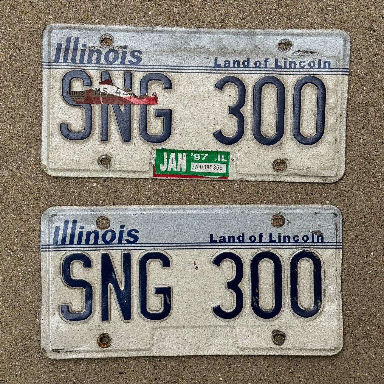 Photo of a 1983 1997 Illinois License Plate Pair Auto Tag Garage Decor Vintage SNG 300