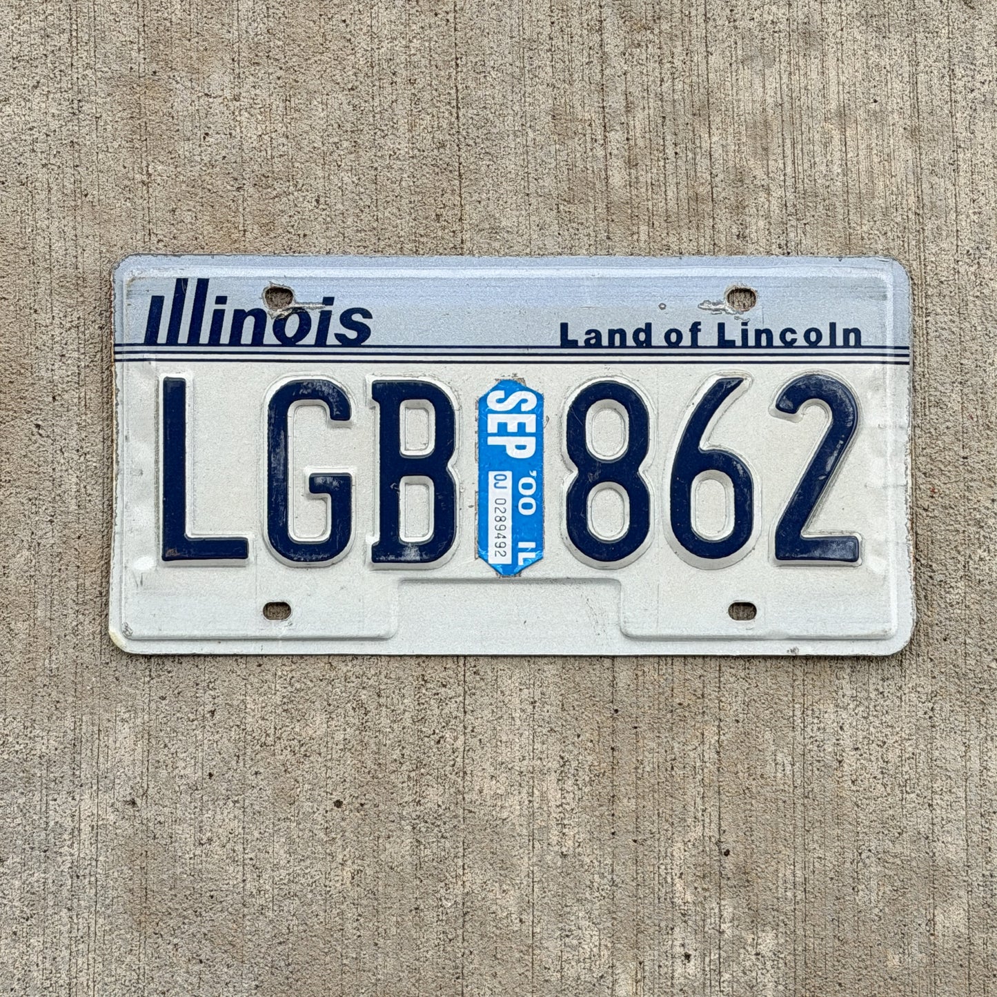 Photo of a 1983 2000 Illinois License Plate Auto Tag Garage Decor Vintage LGB 862 with original patina