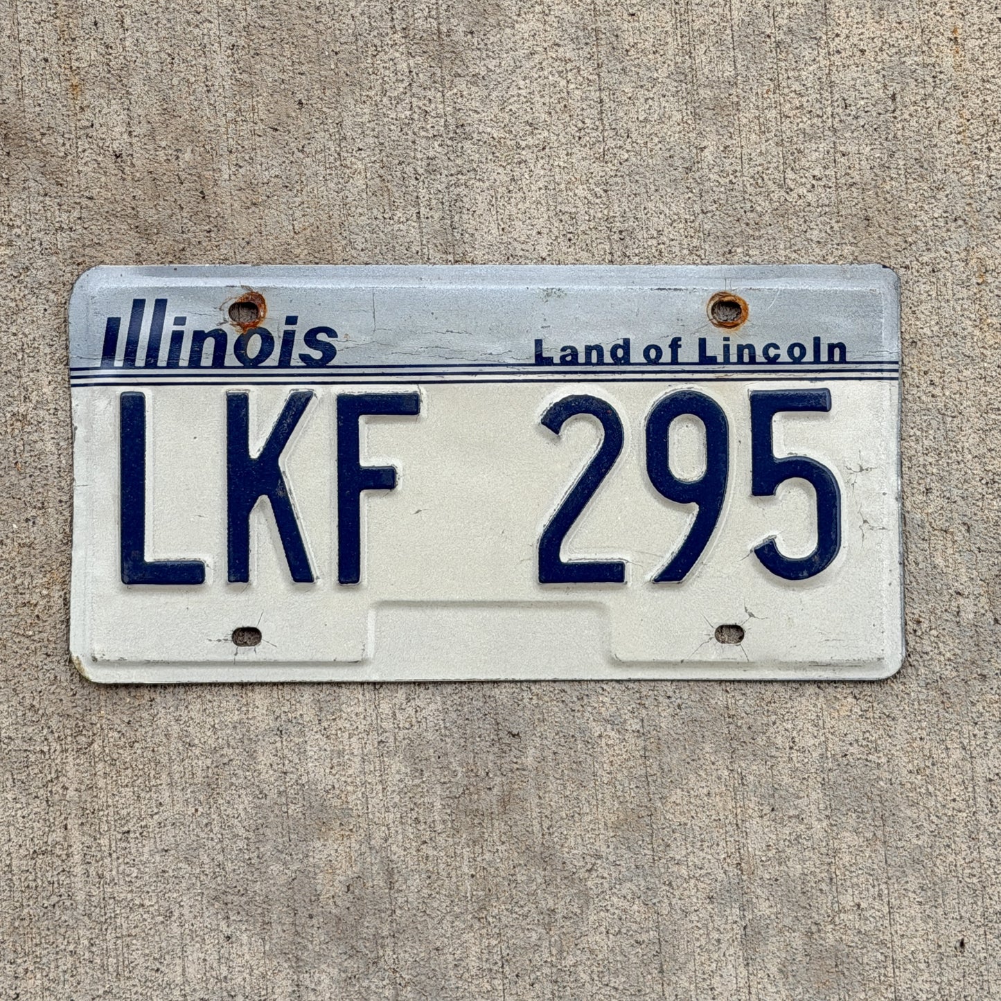 Photo of a 1983 Illinois License Plate Auto Tag Garage Decor Vintage LKF 295 with original patina