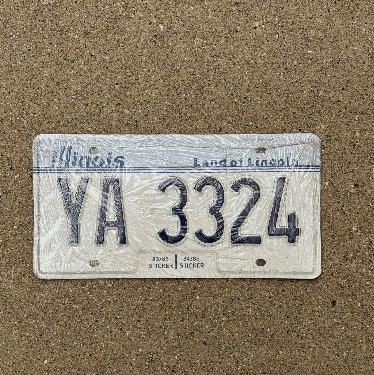 Photo of a 1983 Illinois License Plate Pair Auto Tag Garage Decor Vintage New Old Stock NOS YA 3324