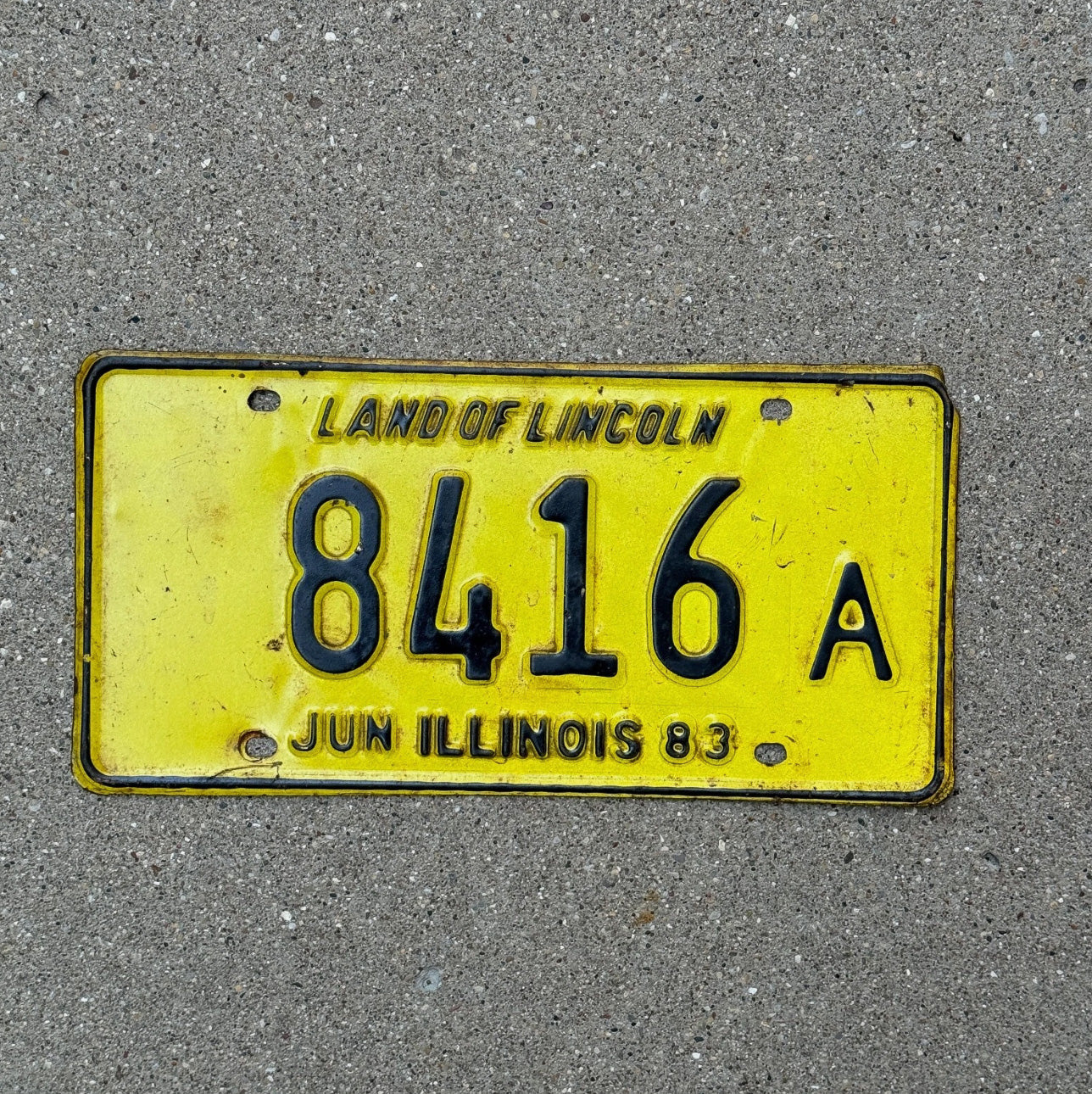 Photo of a 1983 Illinois Truck License Plate Auto Tag Garage Decor Vintage 8416 A