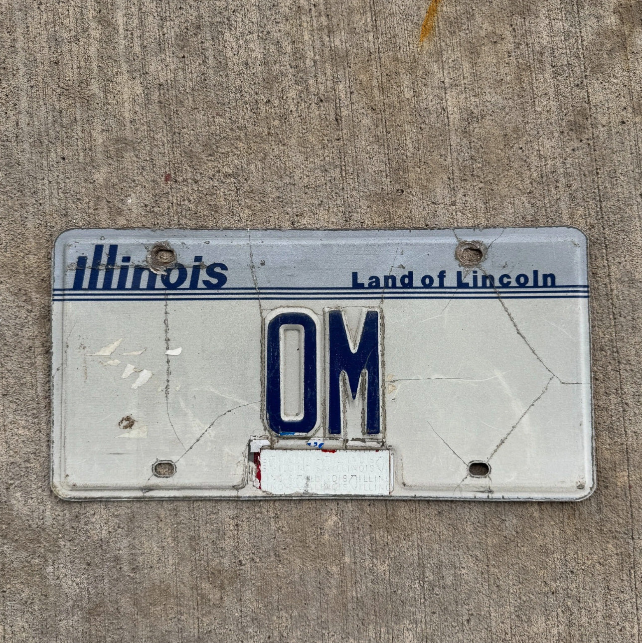 Photo of a 1983 Illinois Vanity License Plate Auto Tag Garage Decor Vintage Initials Mantra Meditation OM