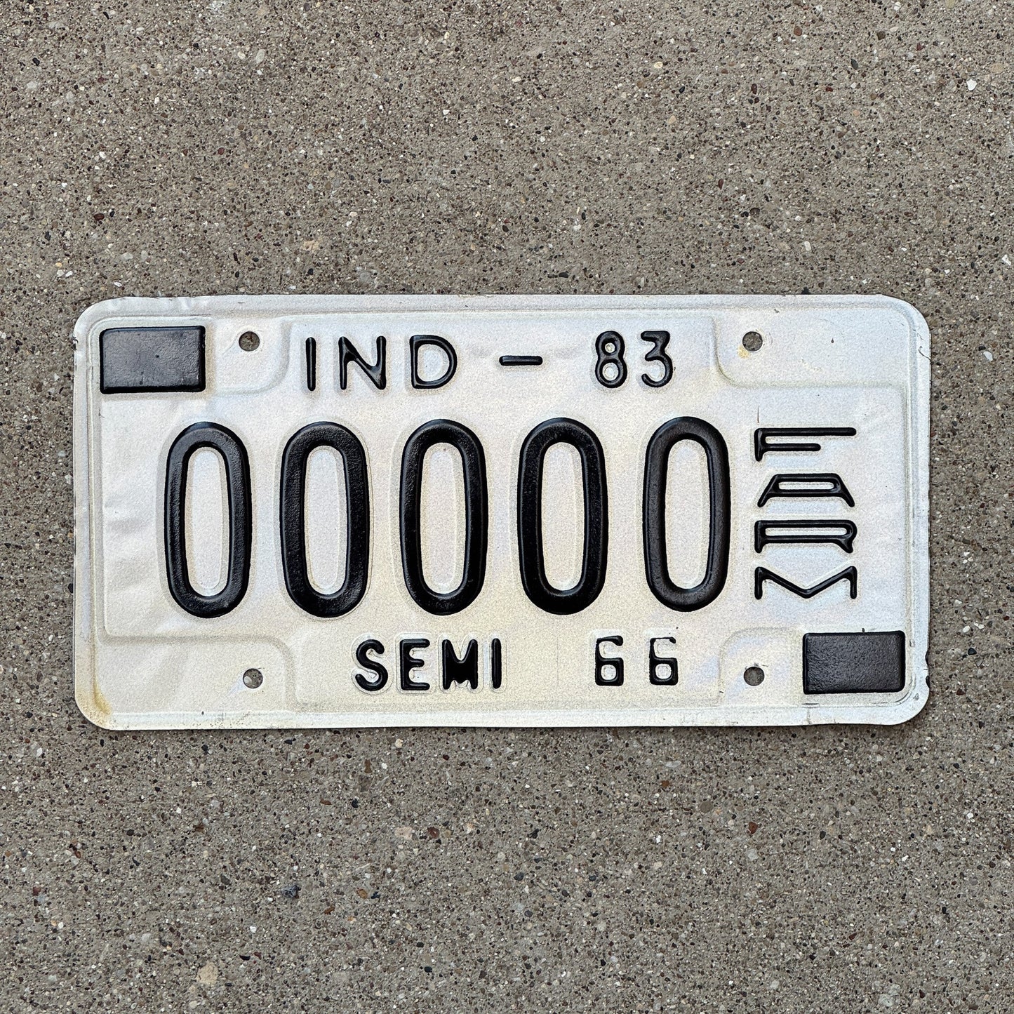 Photo of a 1983 Indiana Farm Semi Trailer License Plate Auto Tag Garage Decor Vintage Sample 0000 with original patina