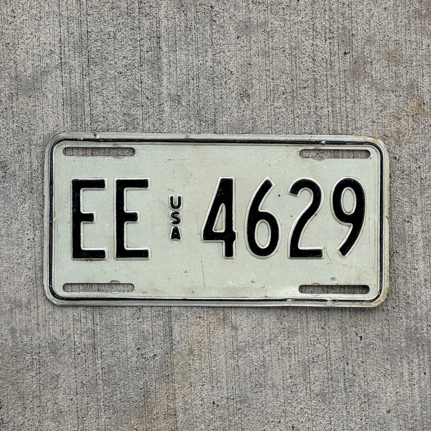 Photo of a 1983 US Forces Germany License Plate Auto Tag Garage Decor Vintage EE 4629 with original patina