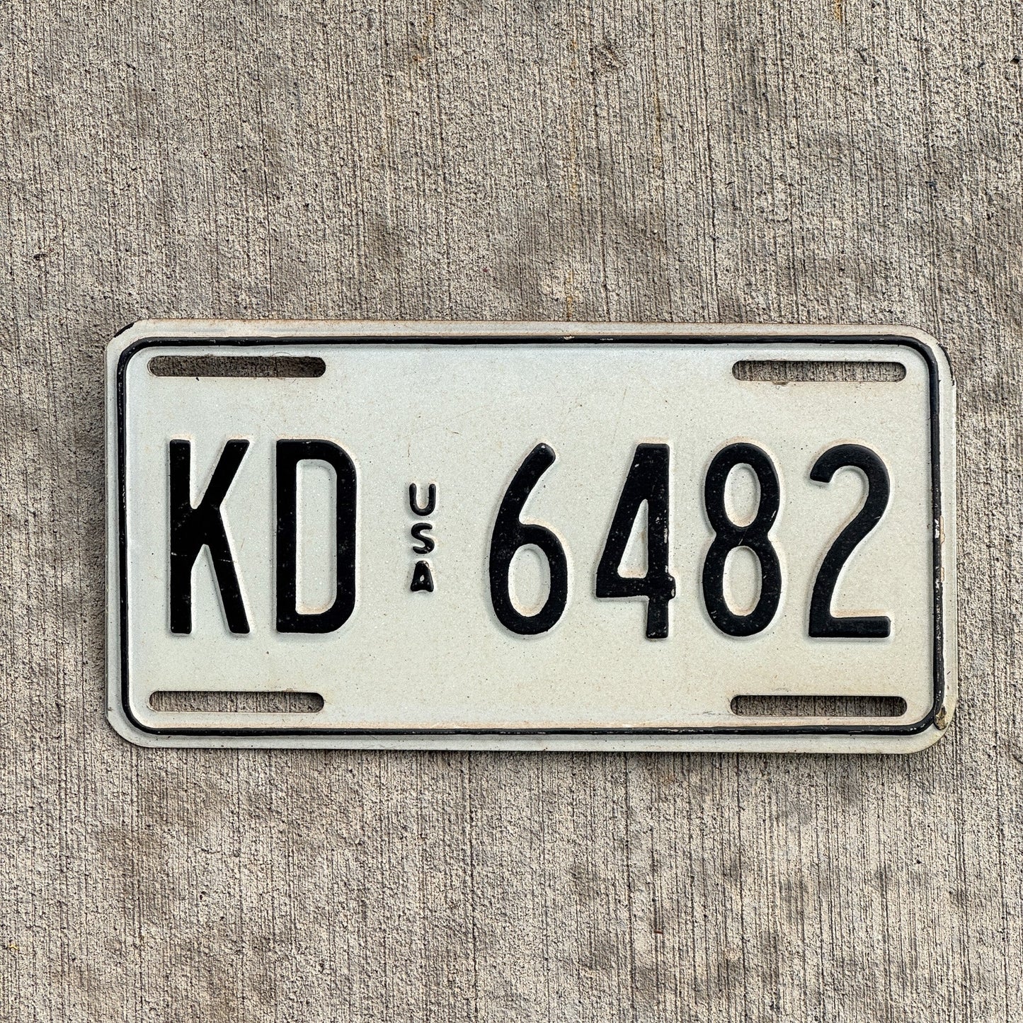 Photo of a 1983 US Forces Germany License Plate Auto Tag Garage Decor Vintage KD 6482 with original patina