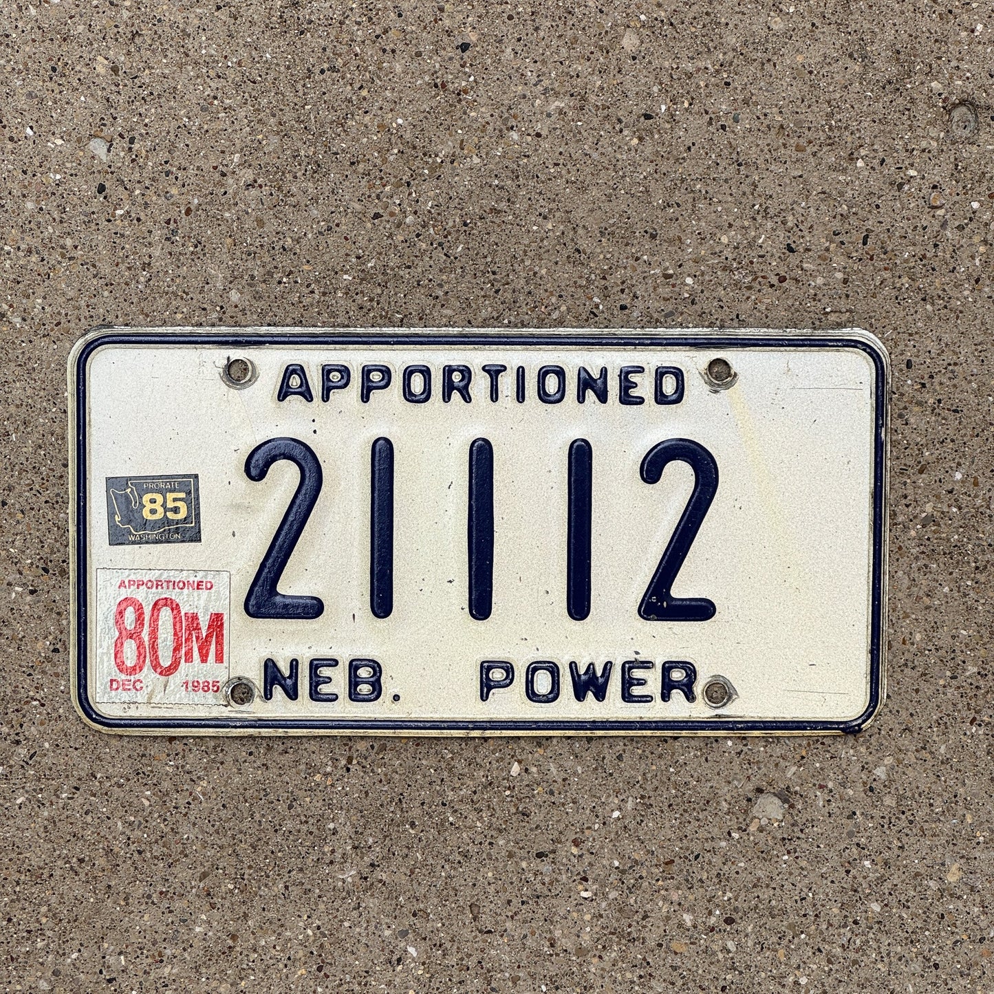 Photo of a 1984 1985 Nebraska Apportioned Power License Plate Auto Tag Garage Decor Vintage Truck Palindrome 21112