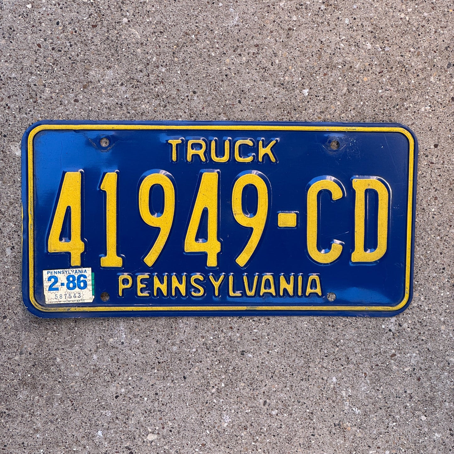 Photo of a 1984 1986 Pennsylvania Truck License Plate Auto Tag Garage Decor Vintage 41949 CD with original patina