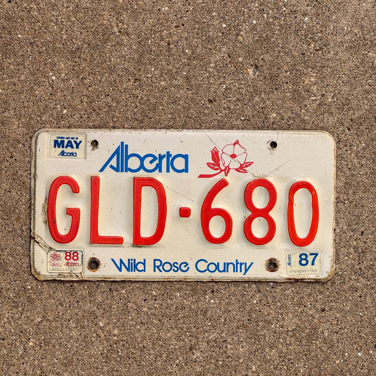 Photo of a 1984 1987 Alberta License Plate Auto Tag Garage Decor Vintage GLD 680