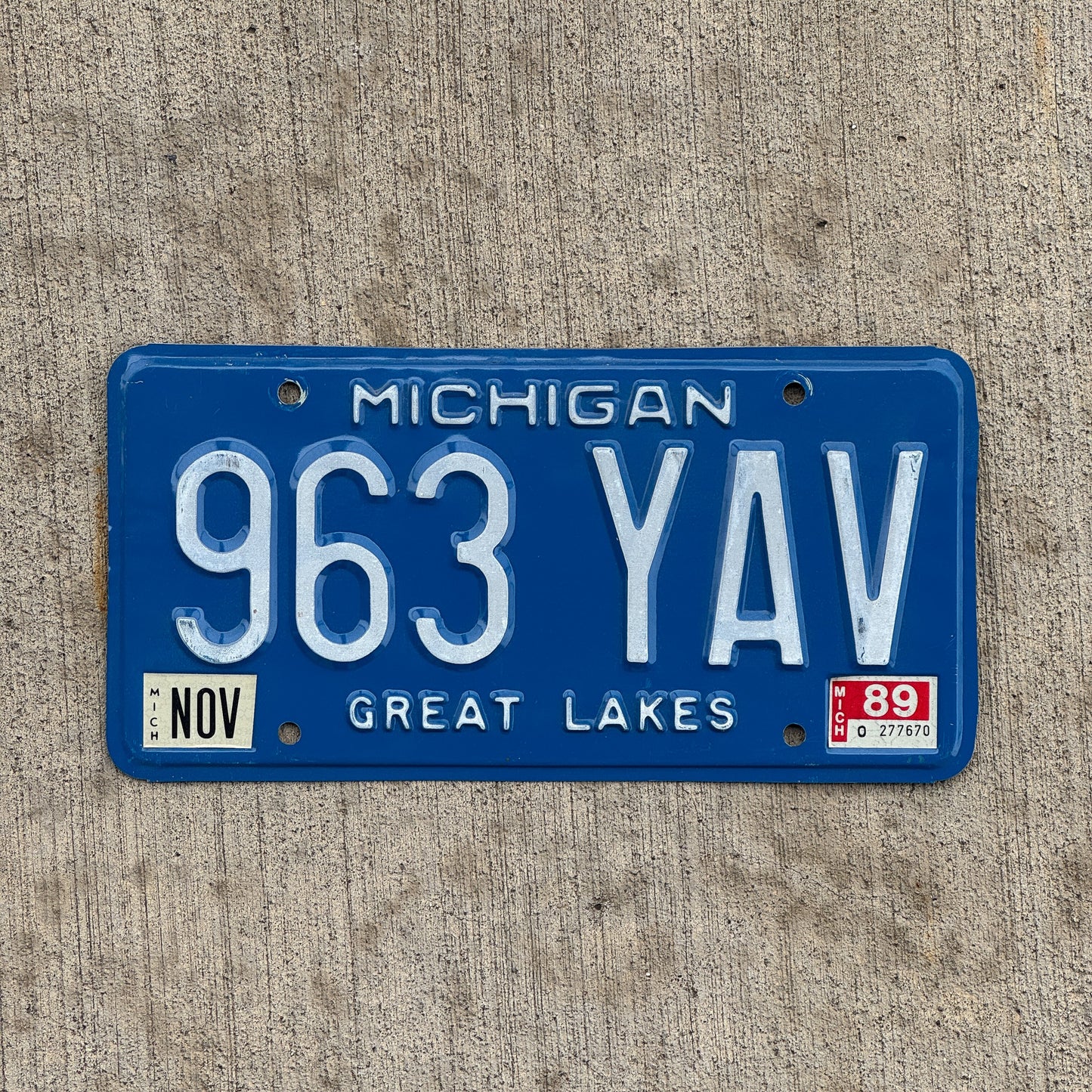 Photo of a 1984 1989 Michigan License Plate Auto Tag Garage Decor Vintage 963 YAV with original patina