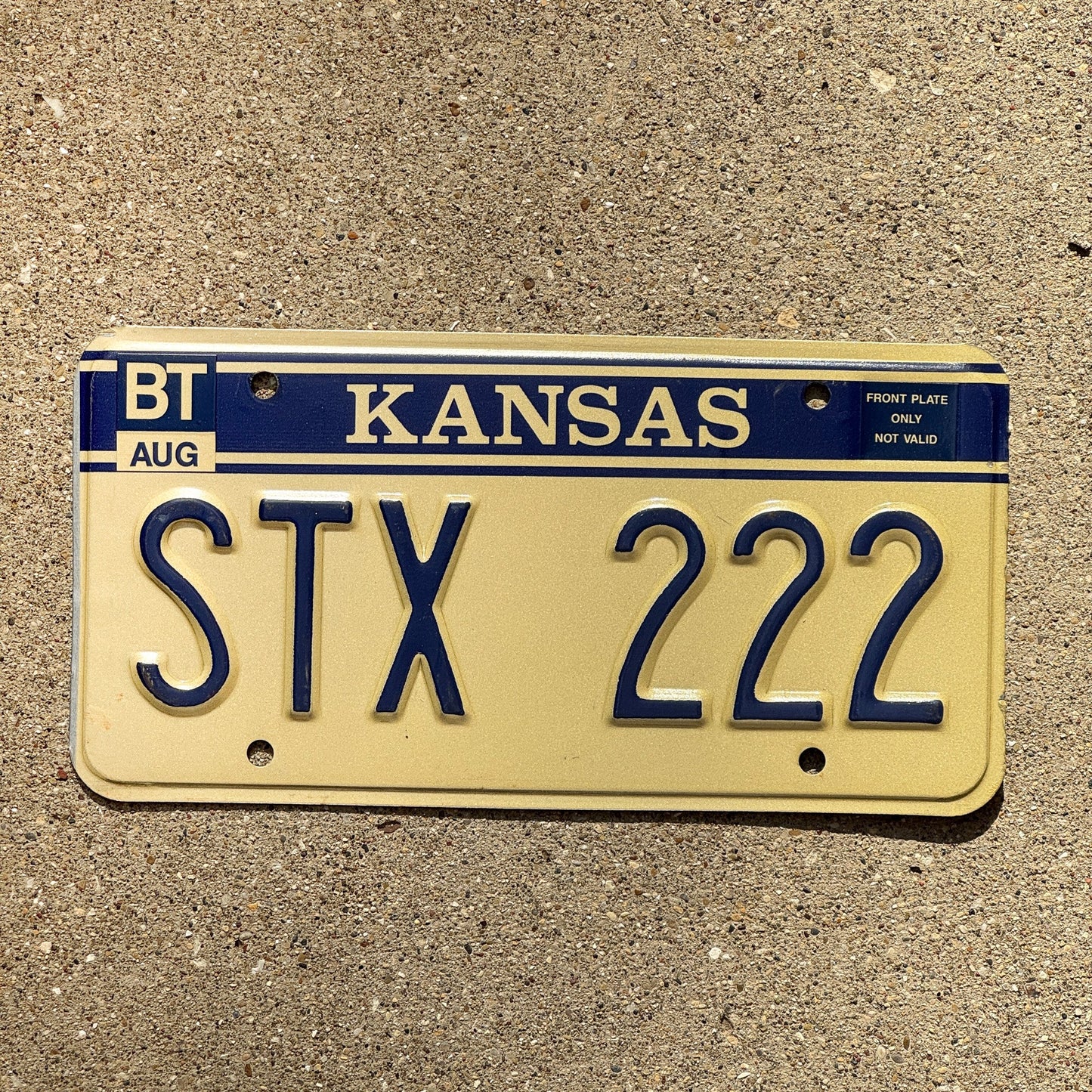 Photo of a 1984 1990 Kansas Vanity License Plate Auto Tag Garage Decor Vintage Repeat Repeating STX 222