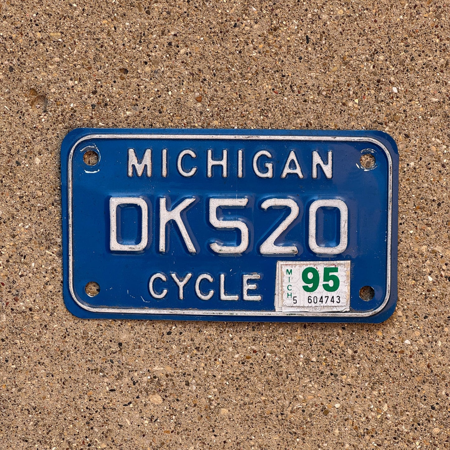 Photo of a 1984 1995 Michigan Motorcycle License Plate Auto Tag Garage Decor Vintage DK 520