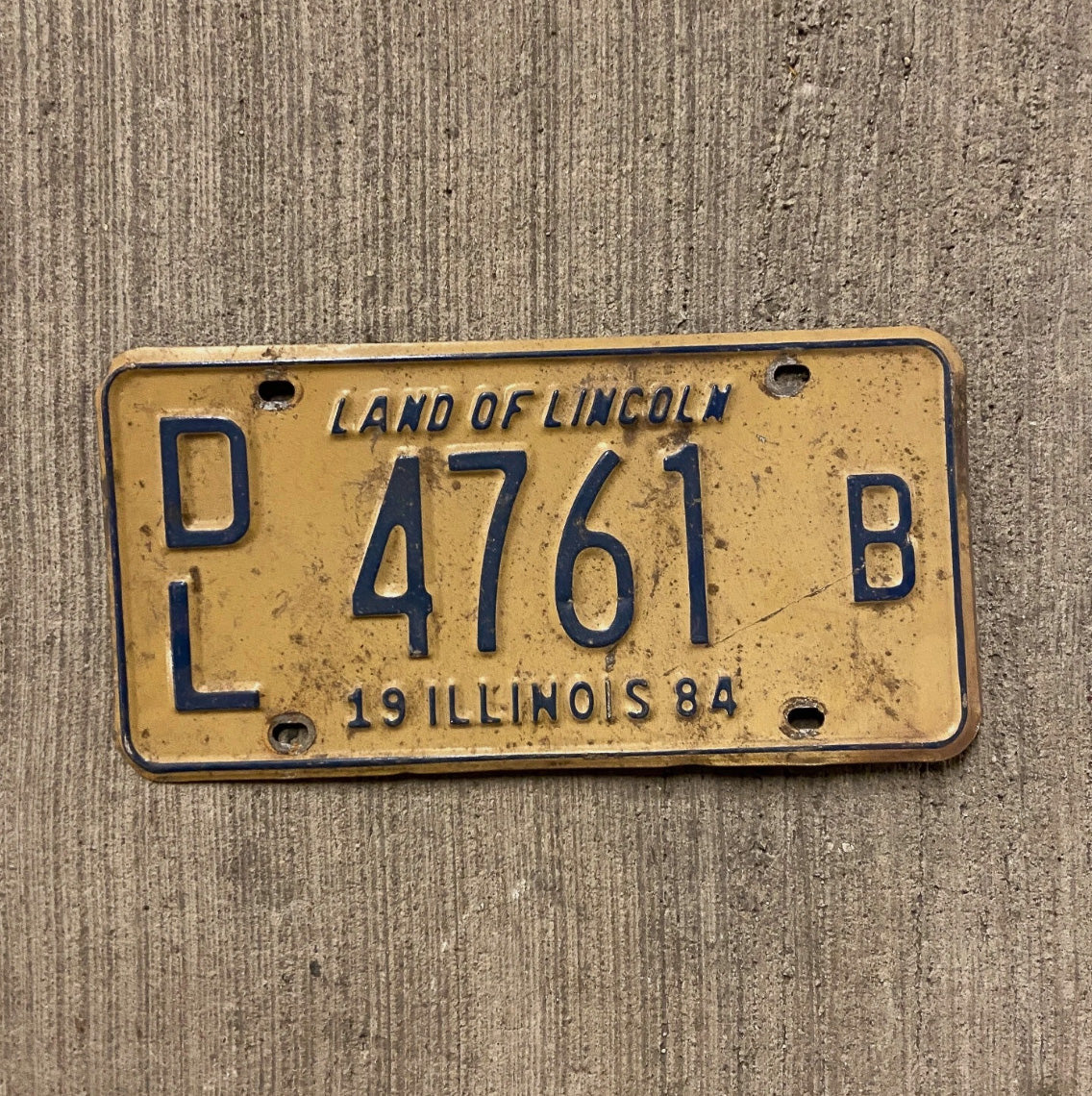 Photo of a 1984 Illinois Dealer License Plate Auto Tag Garage Decor Vintage 4761 B