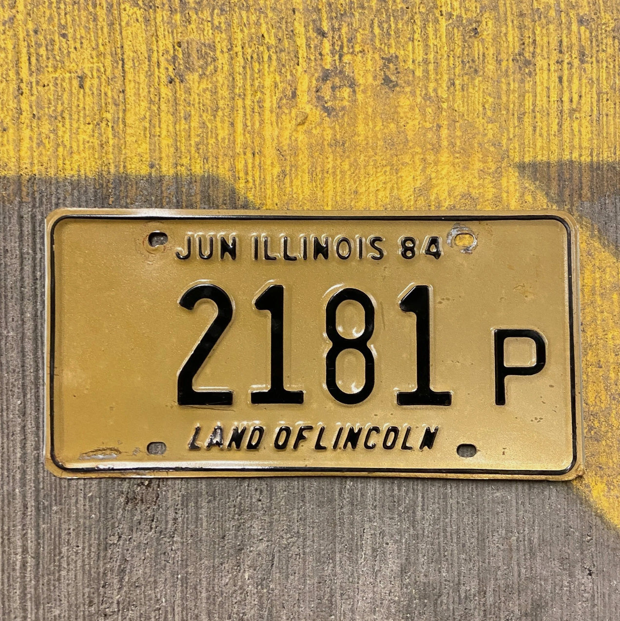Photo of a 1984 Illinois Truck License Plate Auto Tag Garage Decor Vintage 2181 P with original patina