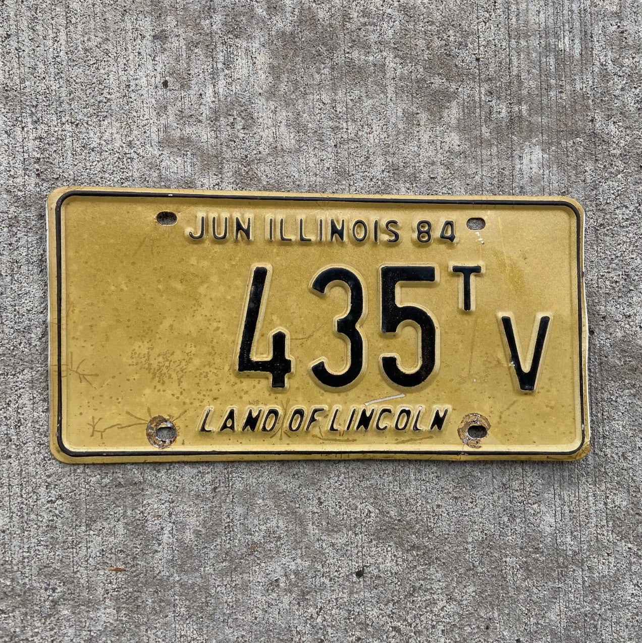 Photo of a 1984 Illinois Truck Tractor License Plate Auto Tag Garage Decor Vintage 435 TV with original patina