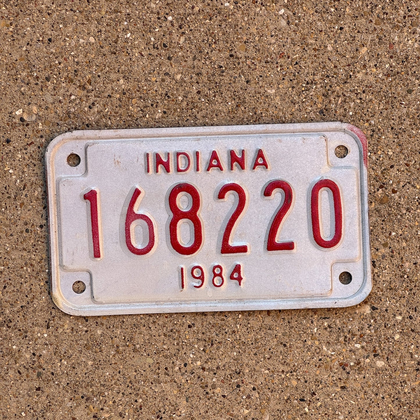 Photo of a 1984 Indiana Motorcycle License Plate Auto Tag Garage Decor Vintage 168220