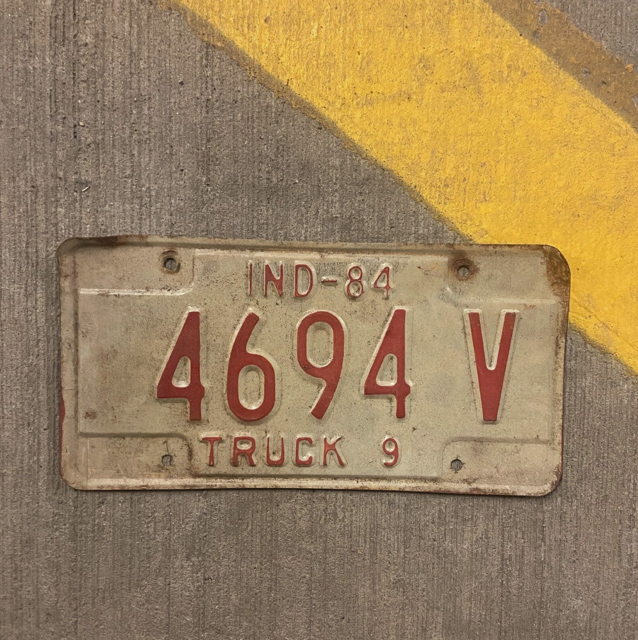 Photo of a 1984 Indiana Truck License Plate Auto Tag Garage Decor Vintage 4694 V