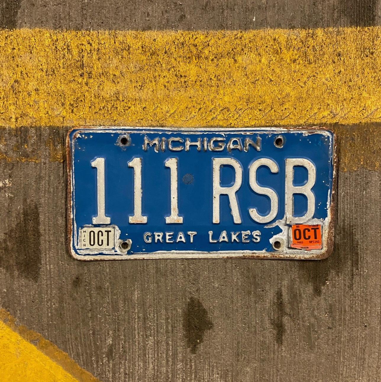 Photo of a 1984 Michigan License Plate Auto Tag Garage Decor Vintage Repeat Repeating Blue 111 RSB