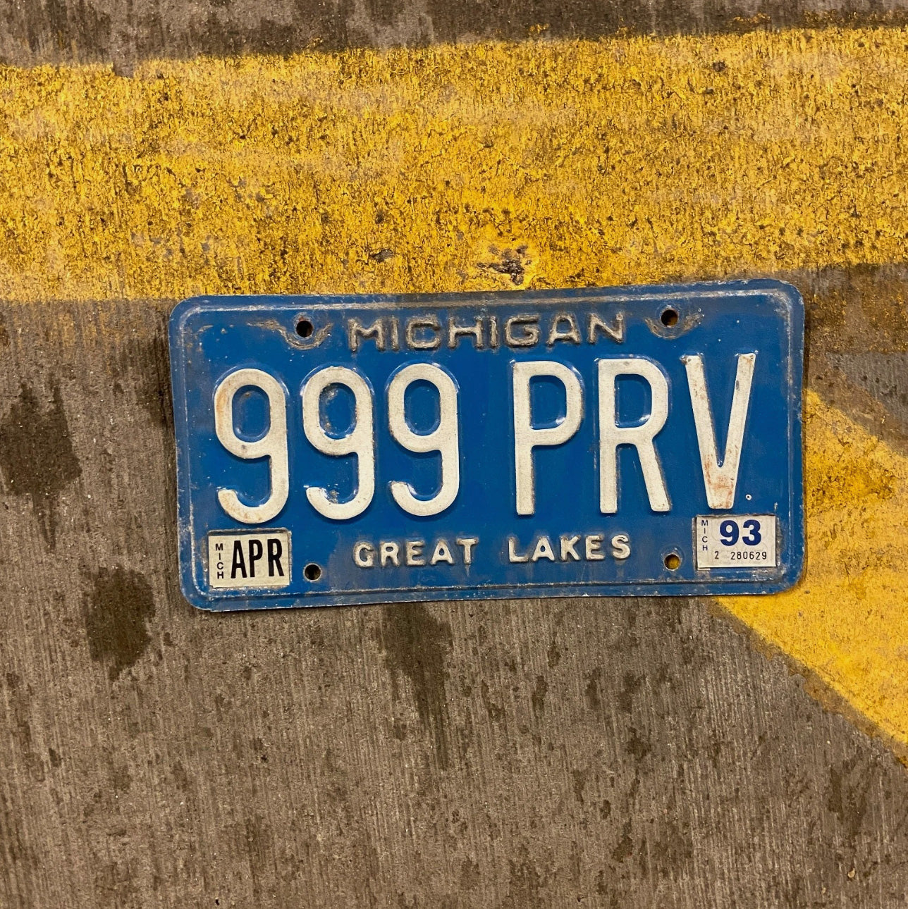 Photo of a 1984 Michigan License Plate Auto Tag Garage Decor Vintage Repeat Repeating Blue 999 PRV