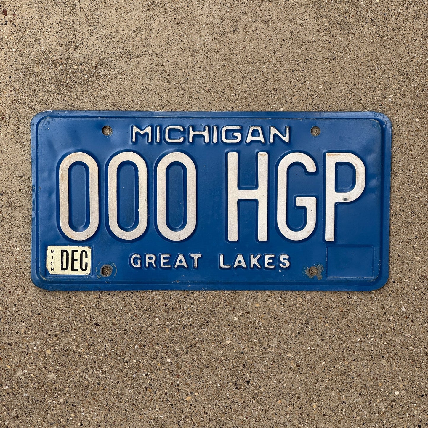 Photo of a 1984 Michigan License Plate Auto Tag Garage Decor Vintage Repeat Repeating, Early in Series 000 HGP