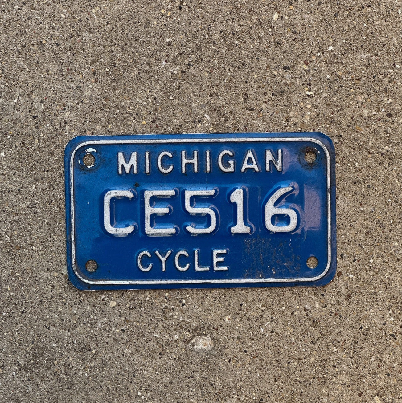 Photo of a 1984 Michigan Motorcycle License Plate Auto Tag Garage Decor CE 516