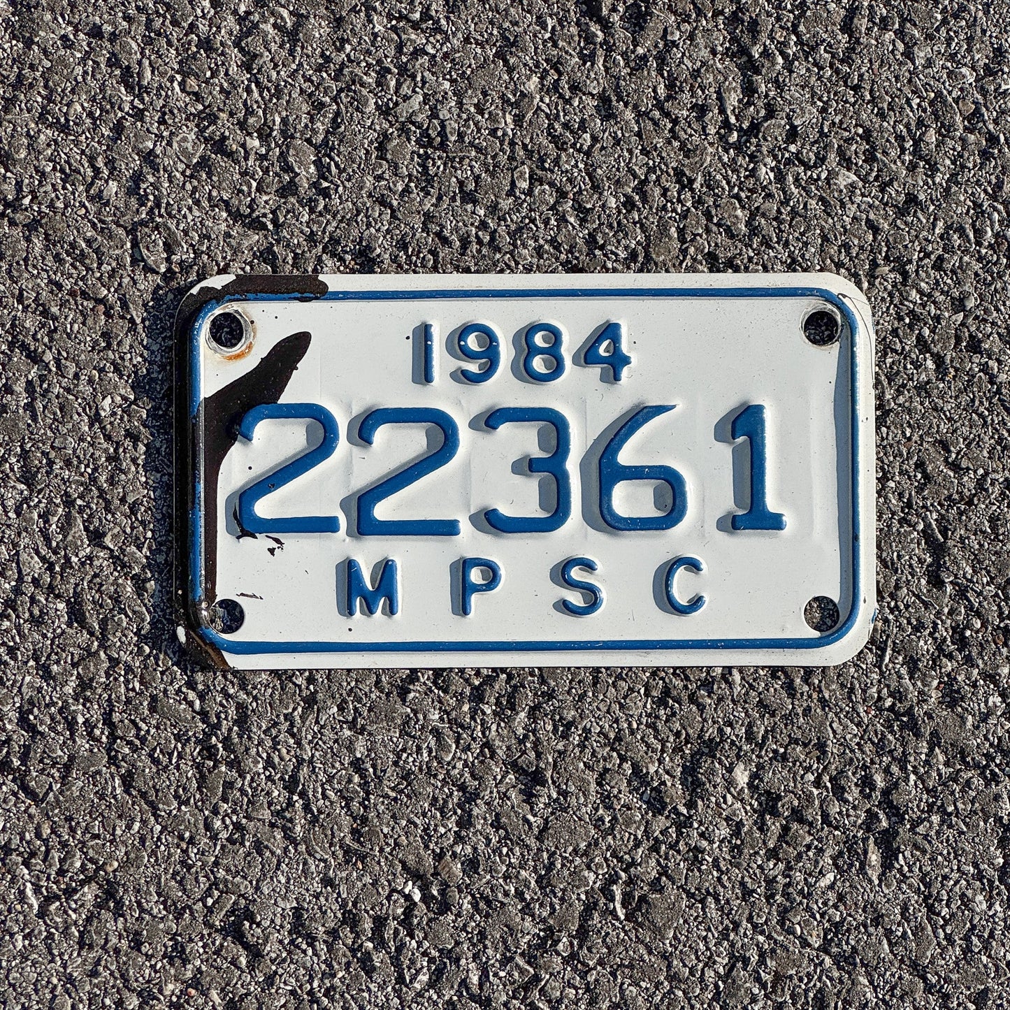 Photo of a 1984 Michigan MPSC License Plate Auto Tag Garage Decor Vintage Public Services Commission 22361