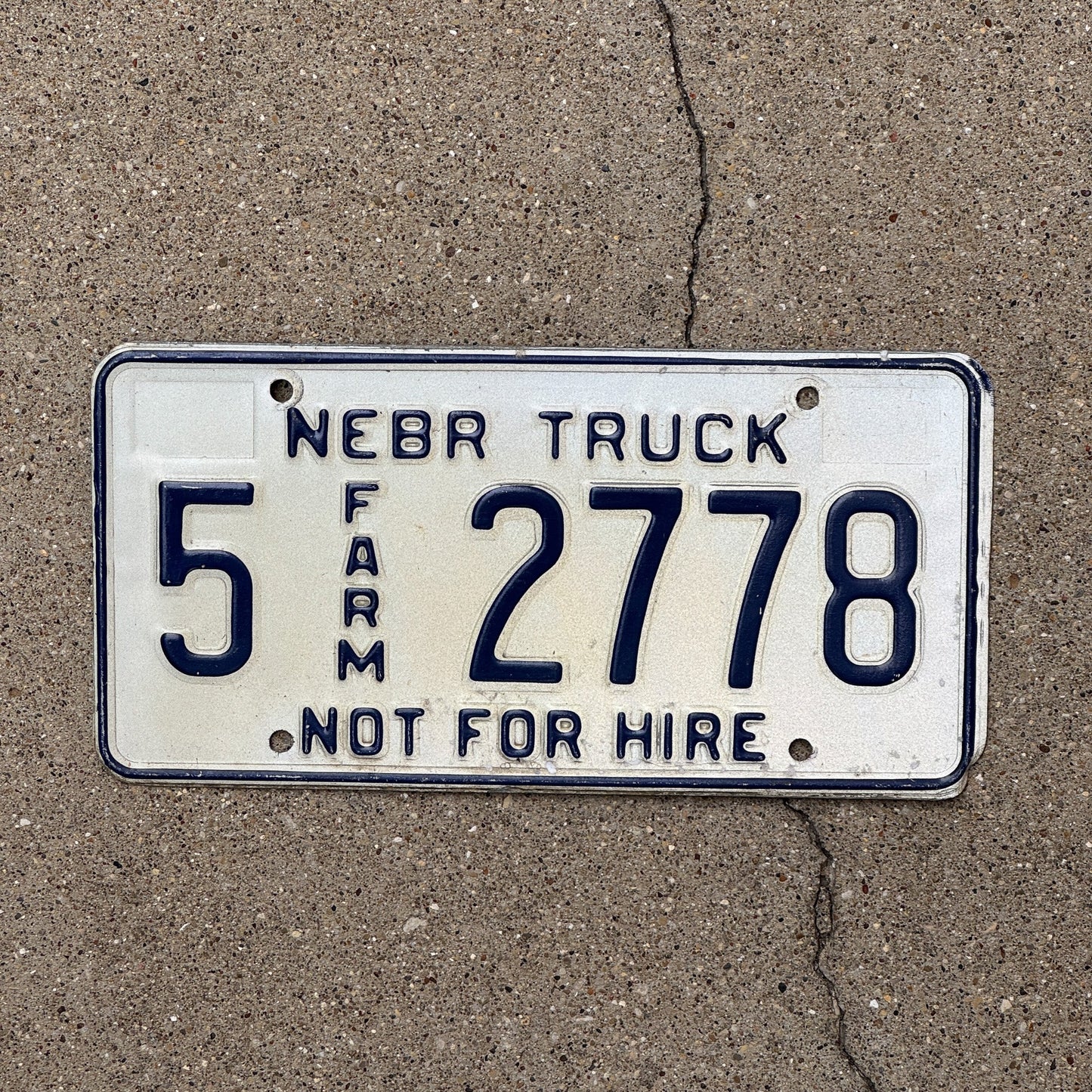 Photo of a 1984 Nebraska Farm Truck License Plate Auto Tag Garage Decor Vintage 5 2778