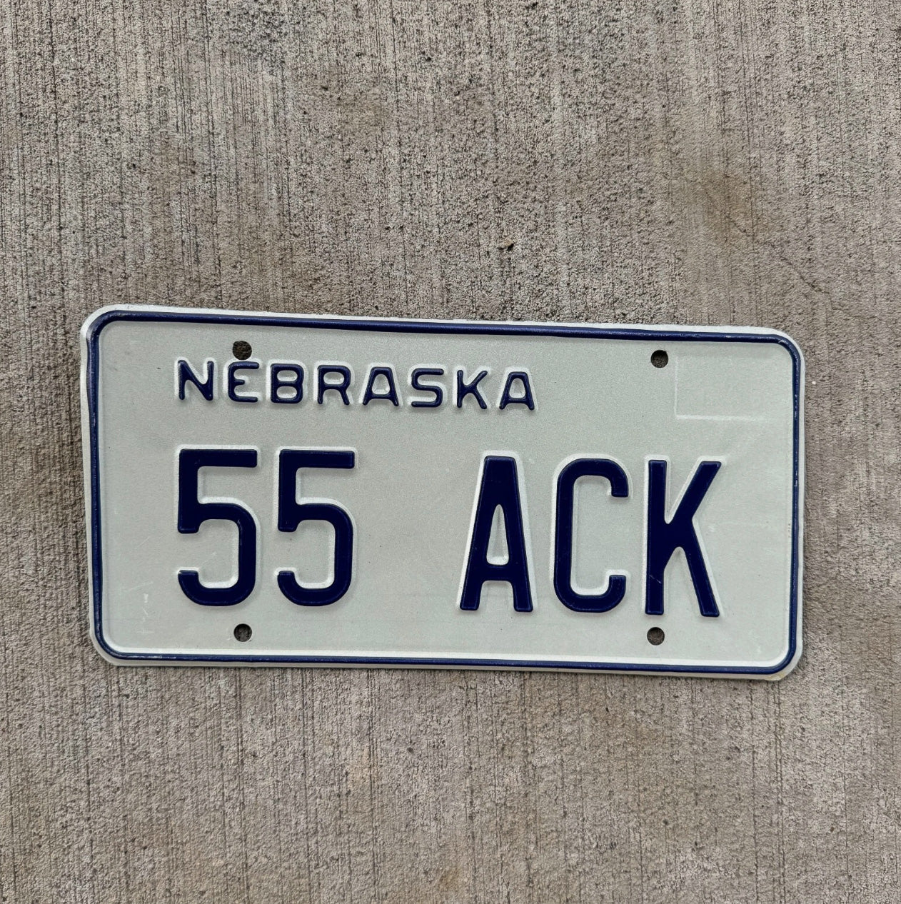 Photo of a 1984 Nebraska Vanity License Plate Auto Tag Garage Decor Vintage Initials Name 55 ACK