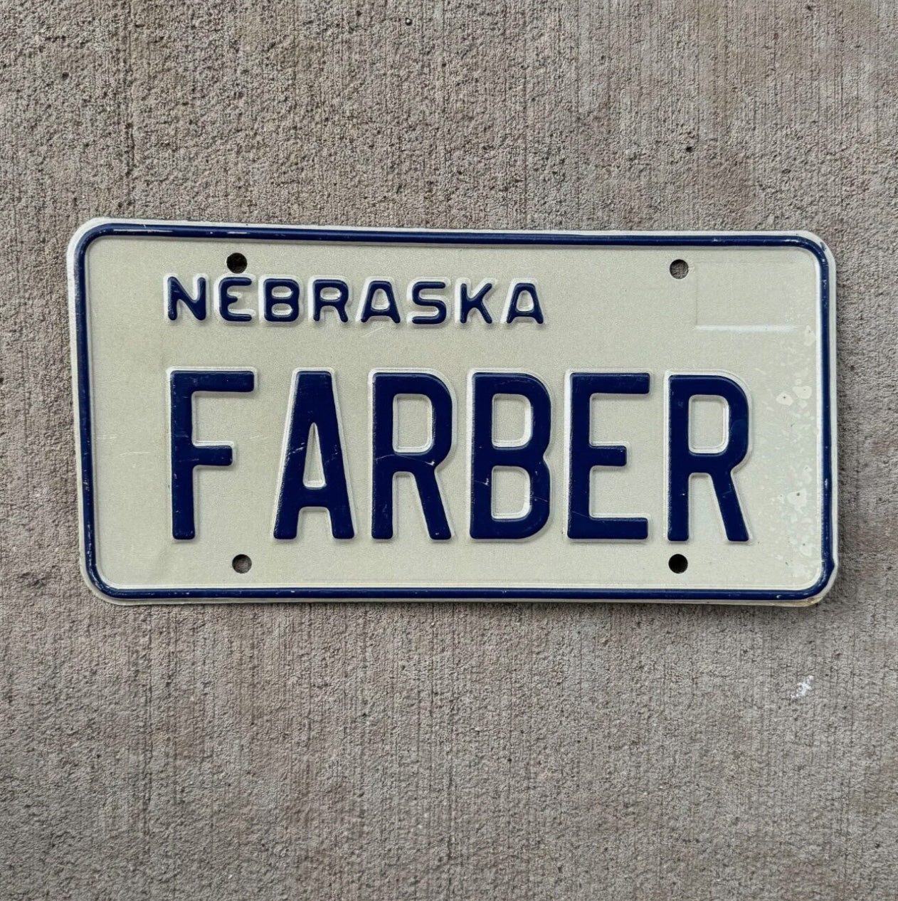 Photo of a 1984 Nebraska Vanity License Plate Auto Tag Garage Decor Vintage Last Name FARBER
