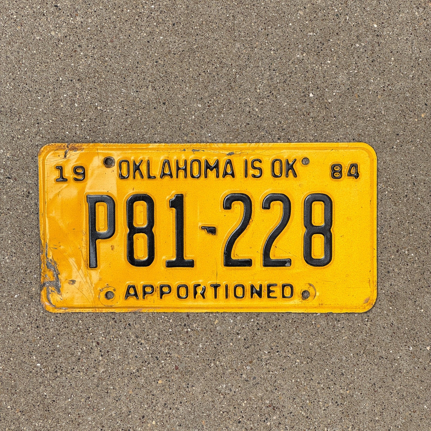 Photo of a 1984 Oklahoma Apportioned License Plate Auto Tag Garage Decor Vintage P 81 228