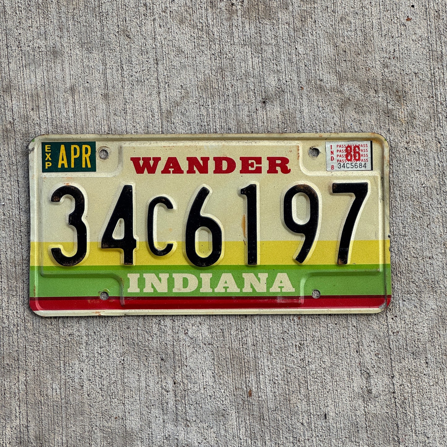 Photo of a 1985 1986 Indiana License Plate Auto Tag Garage Decor Vintage 34 C 6197 with original patina