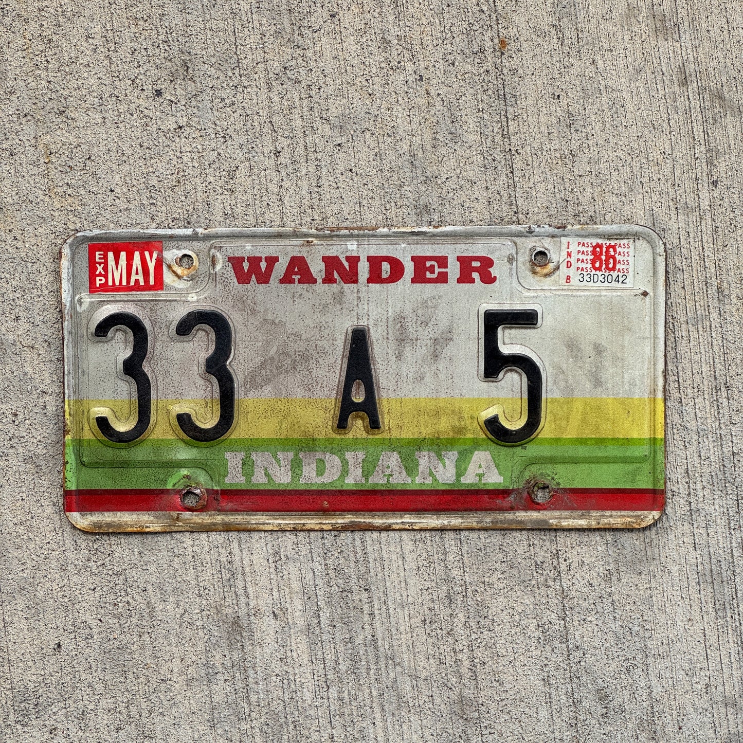 Photo of a 1985 1986 Indiana License Plate Auto Tag Garage Decor Vintage Henry County Low Number 33 A 5 with original patina