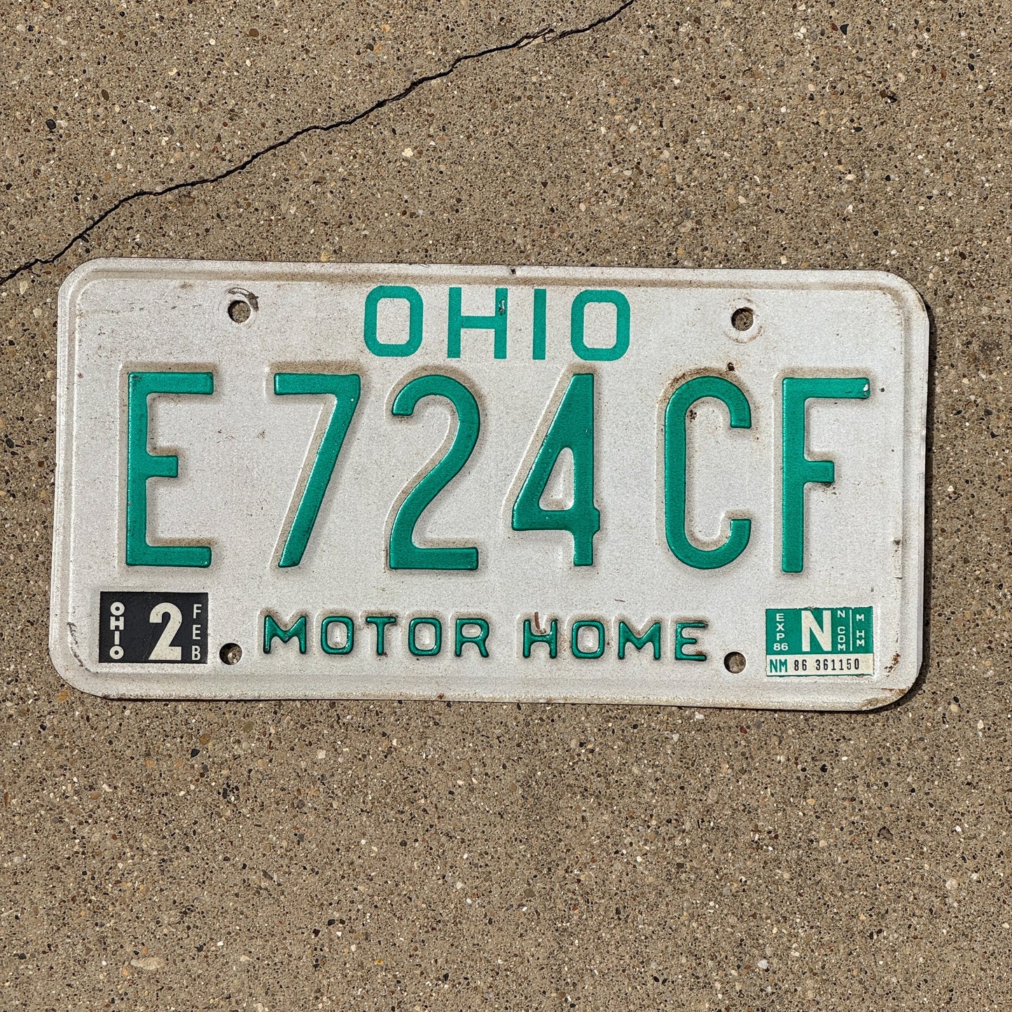 Photo of a 1985 1986 Ohio Motor Home License Plate Auto Tag 2 Garage Decor E 724 CF