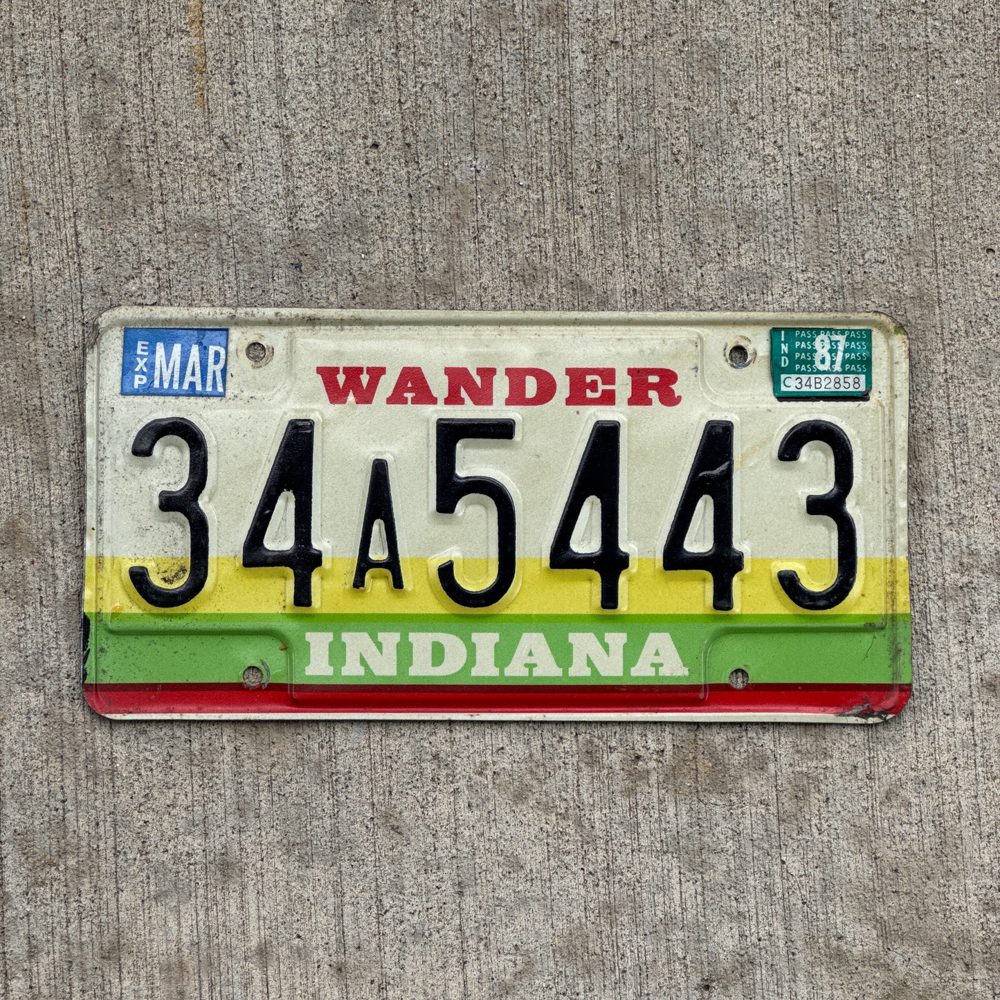 Photo of a 1985 1987 Indiana License Plate Auto Tag Garage Decor Vintage 34 A 5443 with original patina