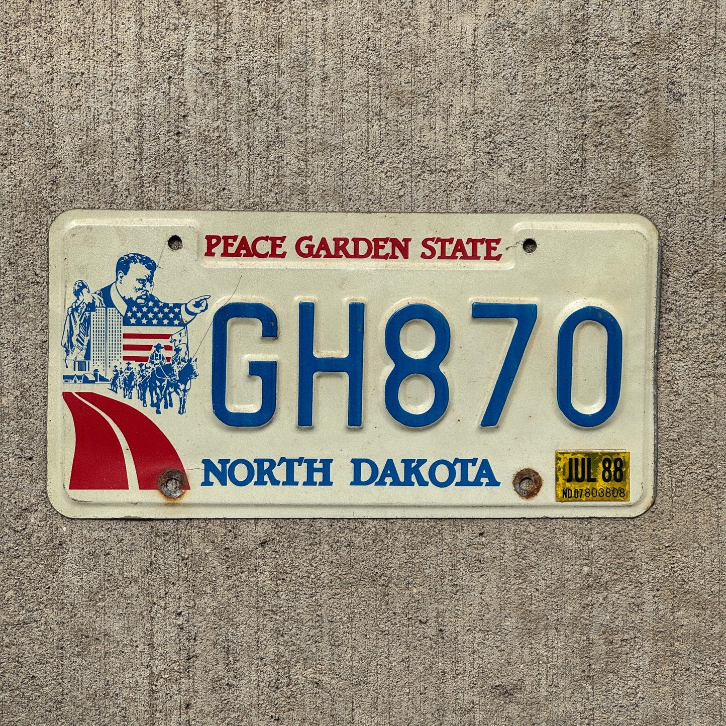 Photo of a 1985 1988 North Dakota License Plate Auto Tag Garage Decor Vintage Teddy Roosevelt GH 870