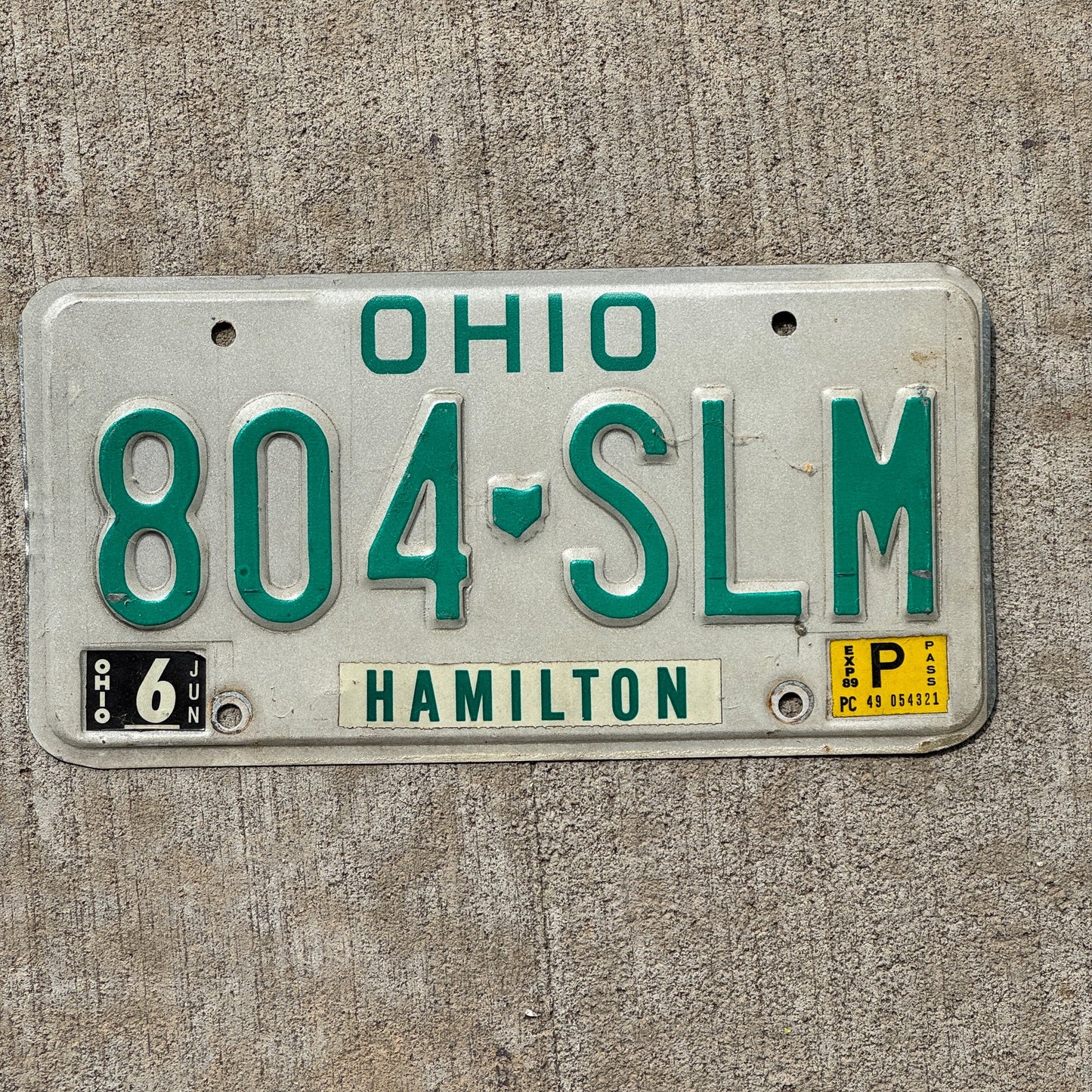 Photo of a 1985 1989 Ohio License Plate Auto Tag Garage Decor Vintage Hamilton 804 SLM