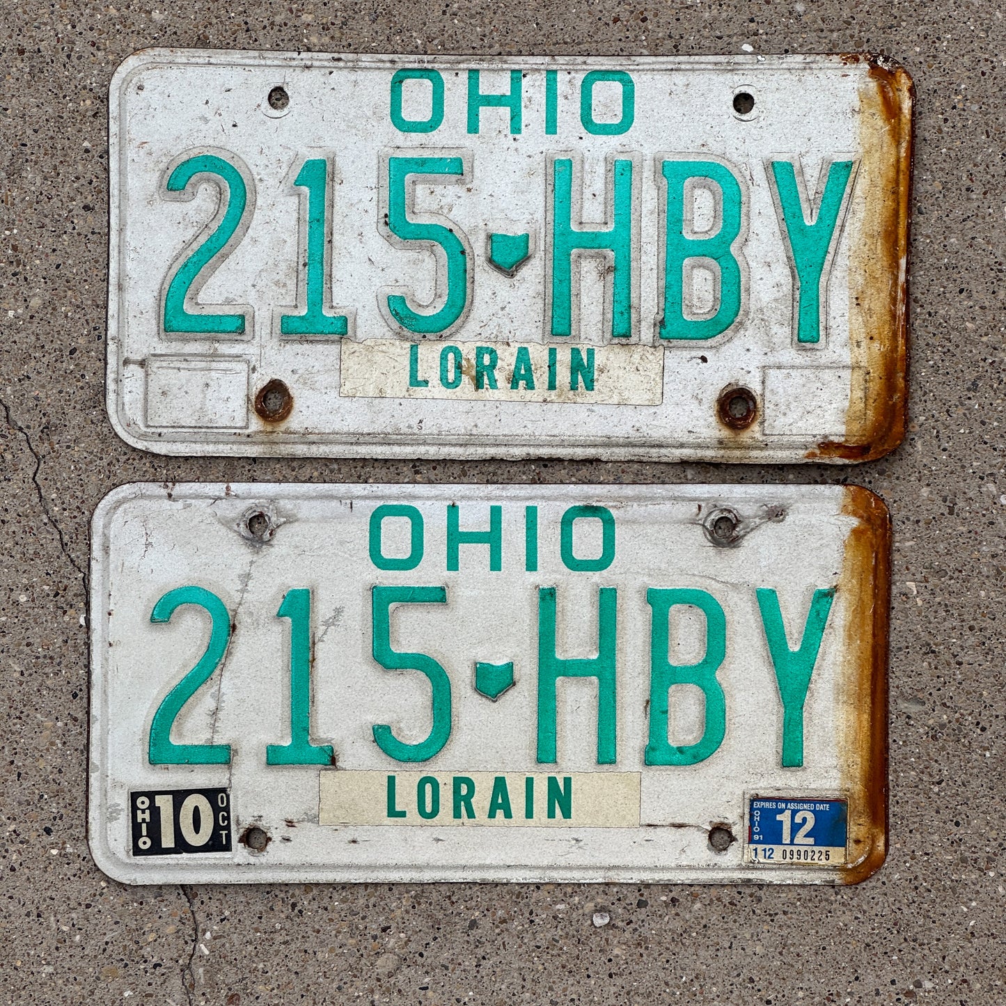 Photo of a 1985 1991 Ohio License Plate Pair Auto Tag Garage Decor Vintage 215 HBY with original patina