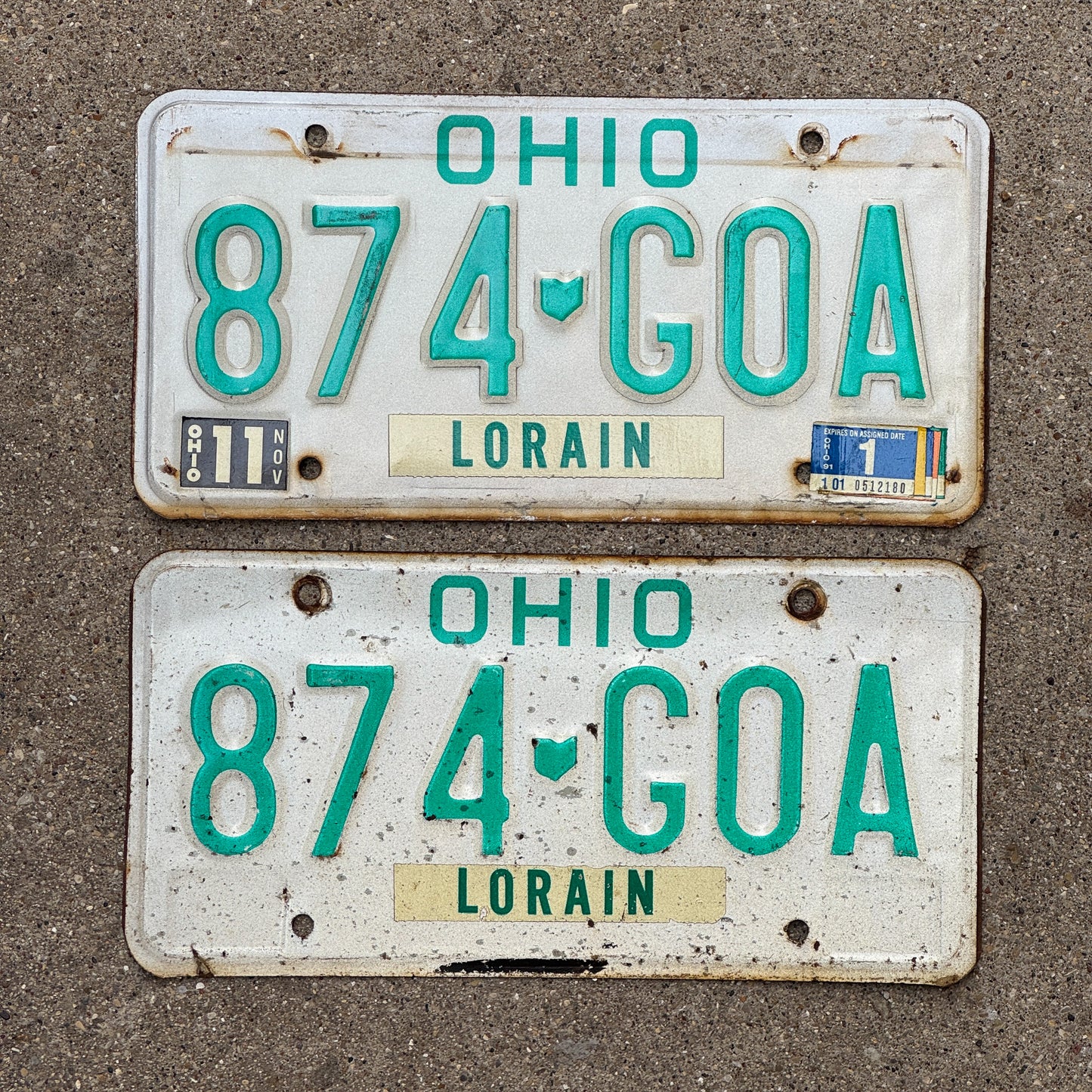 Photo of a 1985 1991 Ohio License Plate Pair Auto Tag Garage Decor Vintage 874 GOA with original patina