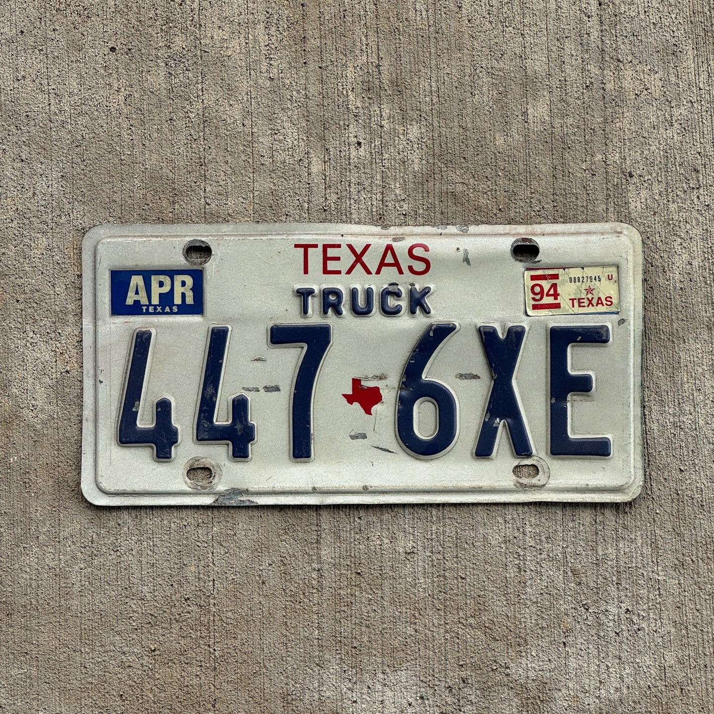 Photo of a 1985 1994 Texas Truck License Plate Auto Tag Garage Decor Vintage 447 6XE with original patina